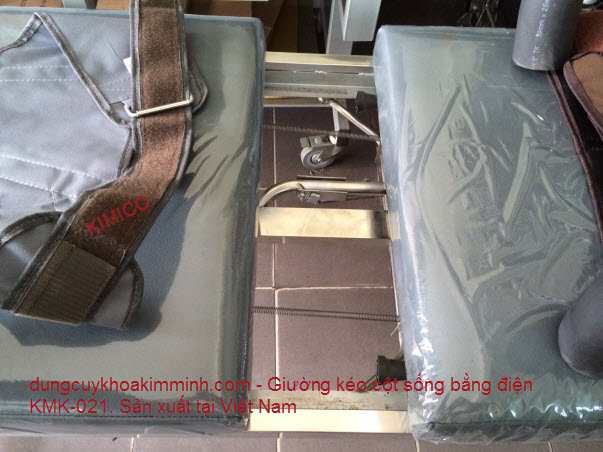Giường trị tho&aacute;t vị đĩa đệm k&eacute;o lưng KMK-021