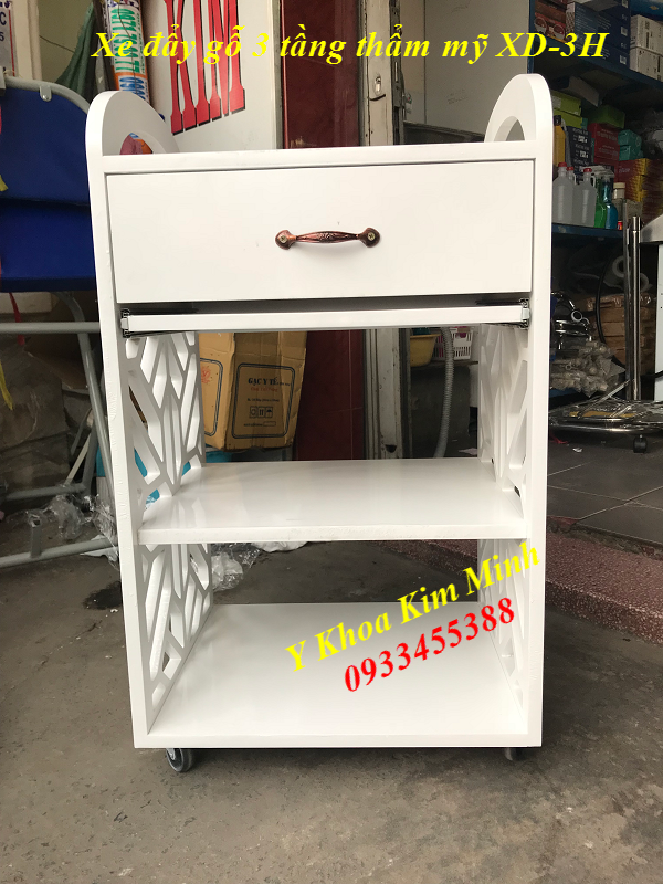 Xe đẩy gỗ thẩm mỹ màu trắng 3 tầng - Y khoa Kim Minh Xe đẩy gỗ thẩm mỹ 3 tầng màu trắng XD-3H bán tại Y khoa Kim Minh 0933455388