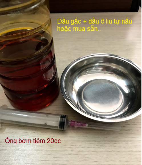 Dầu gấc và dầu ô liu nấu lên giúp chữa bệnh giãn tĩnh mạch bằng cách xoa bóp và dùng với rượu thuốc đắp chữa giãn tĩnh mạch - Y khoa Kim Minh 0933455388